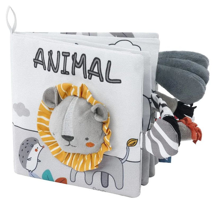 Animal fabric book with a soft lion cover, gathered mane and assorted fabric tails