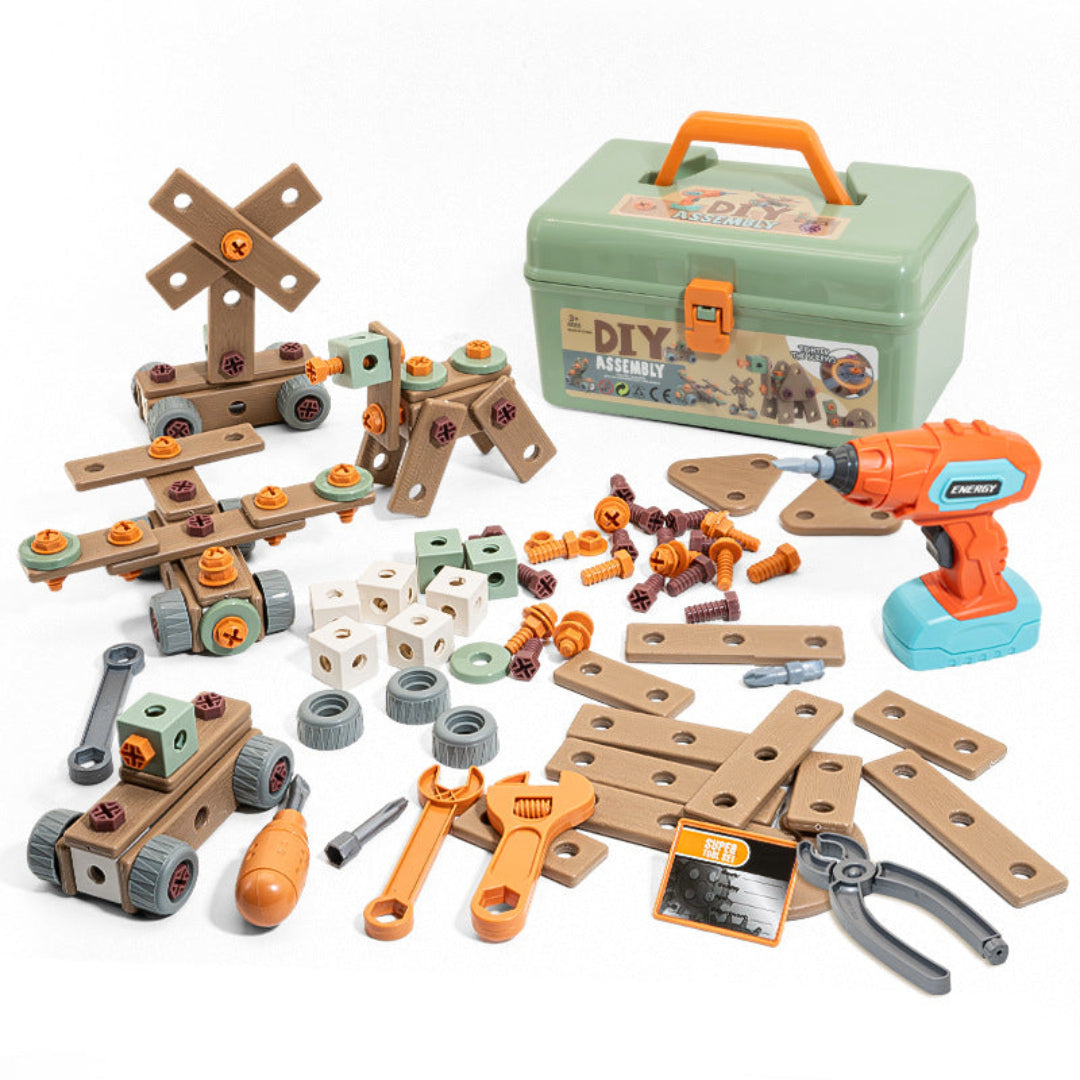 Orange toy drill and hand tools with building parts, wheels, and a green carrying case
