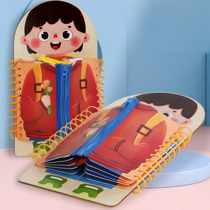 Dress-up activity books showing a blue zippered cover, layered clothing pages, and yellow spiral binding