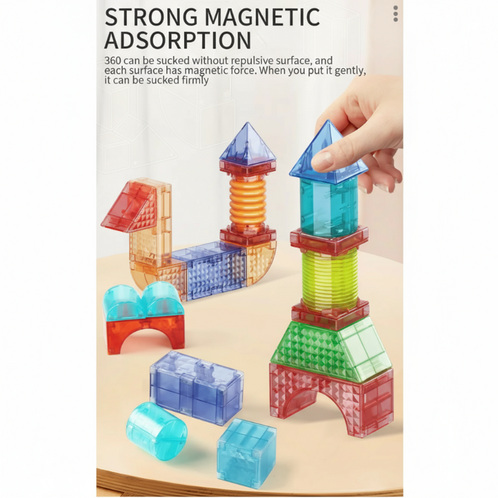Hand placing a blue pyramid piece on a magnetic block tower.