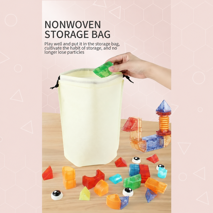 Hand placing a green magnetic block into a cream storage bag beside loose pieces and a tower.