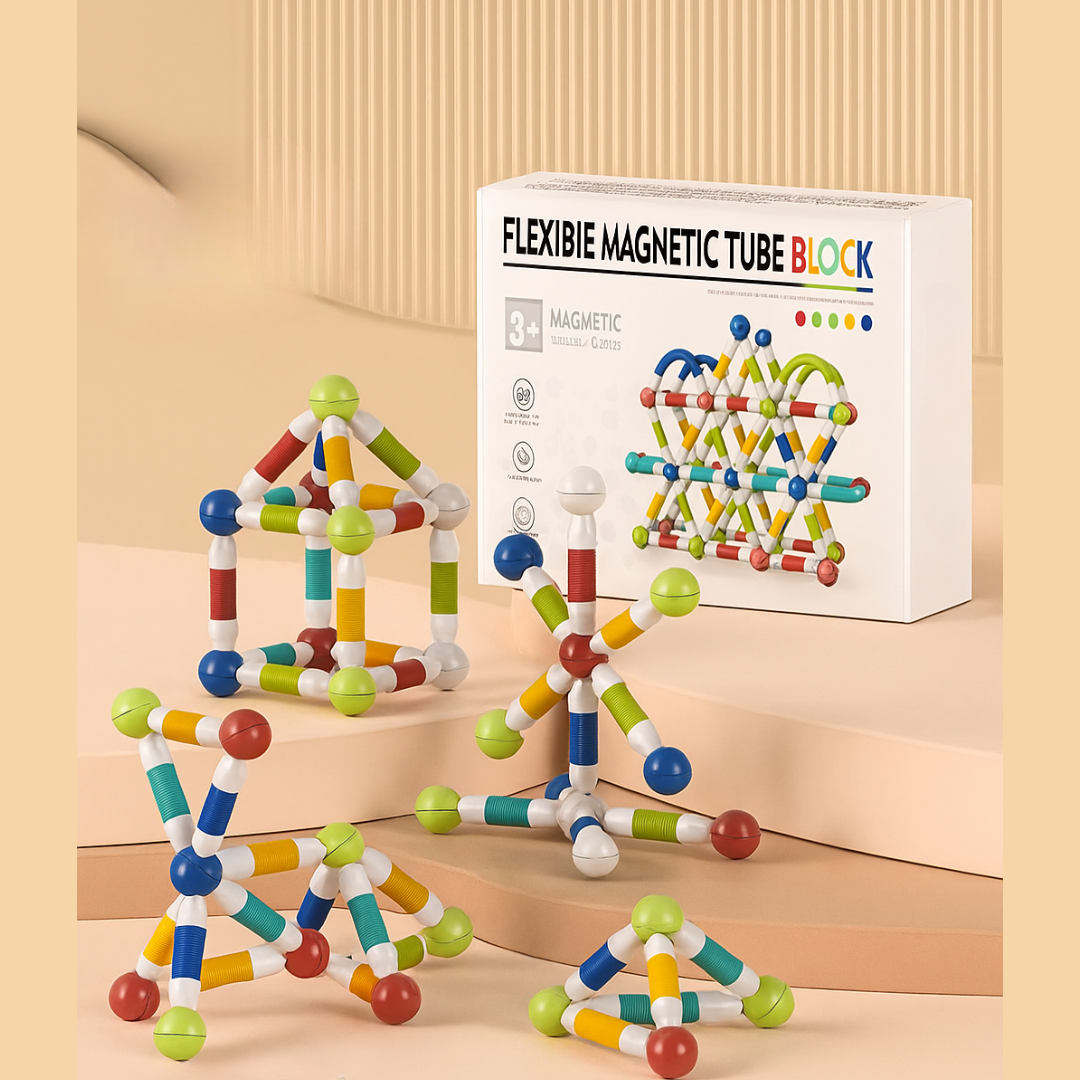 28-piece magnetic building set with small house and geometric models beside its box