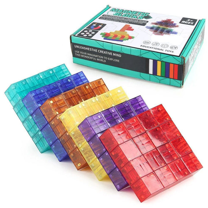 96-piece magnetic cube set arranged in overlapping color panels beside its box.