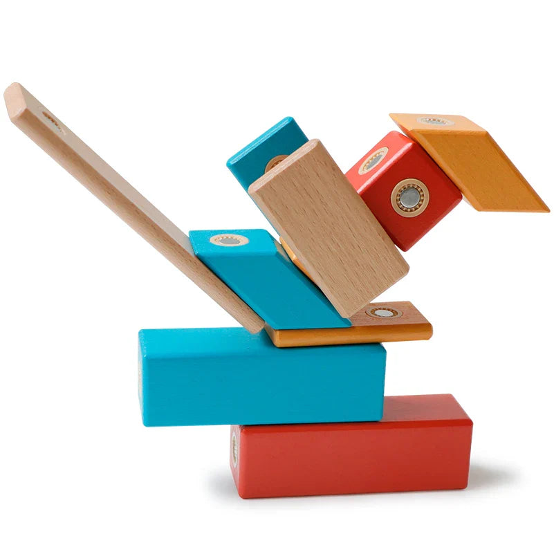 Bird-shaped build made from red, teal, yellow, and natural wood magnetic pieces