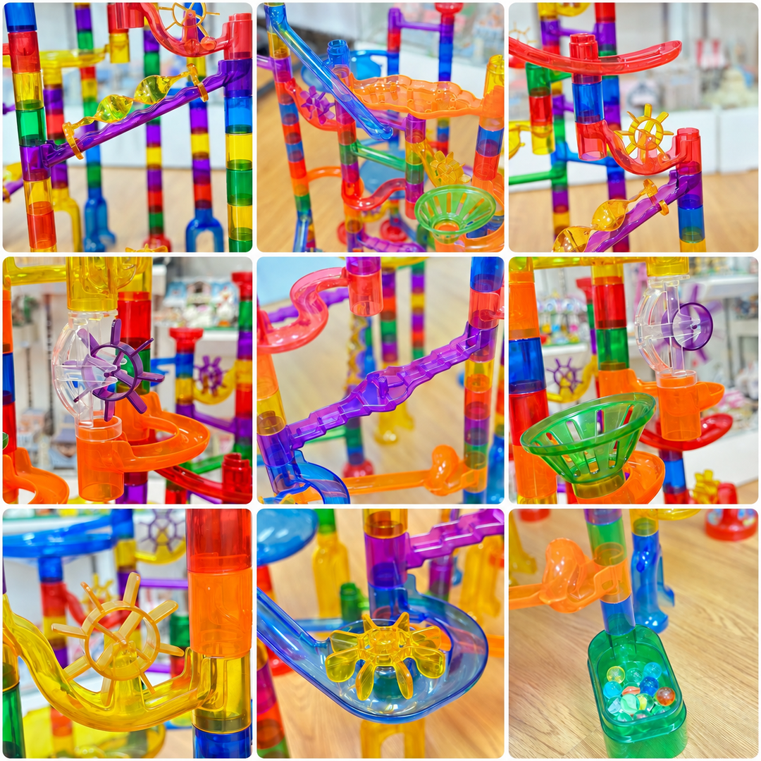 Close-up views of marble run ramps, spinning wheels, funnels, and collection pieces