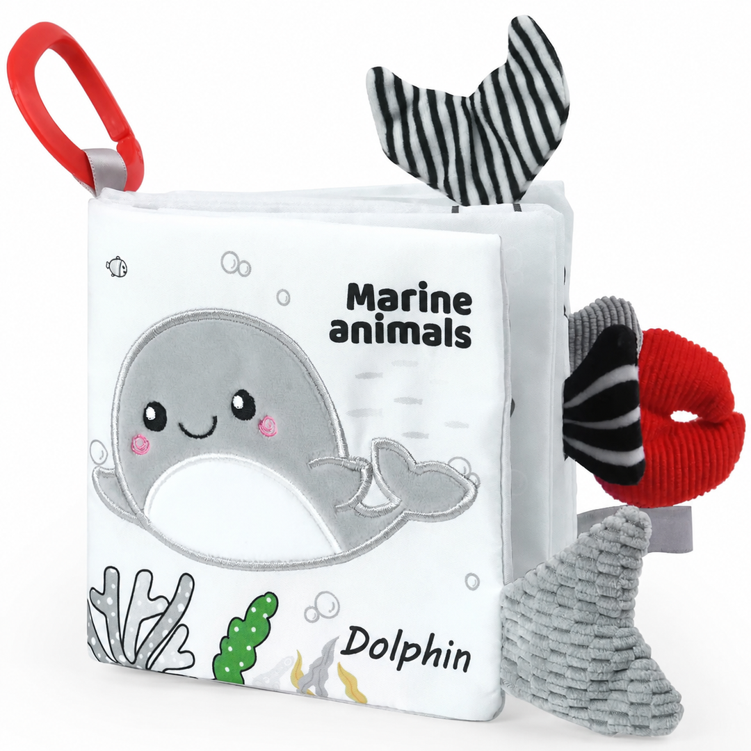Sea creature fabric book with a dolphin cover, striped fabric tail and red hanging loop
