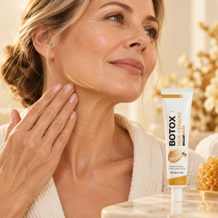 Applying Melissara Bee Venom Rejuvenation Cream to neck and jawline