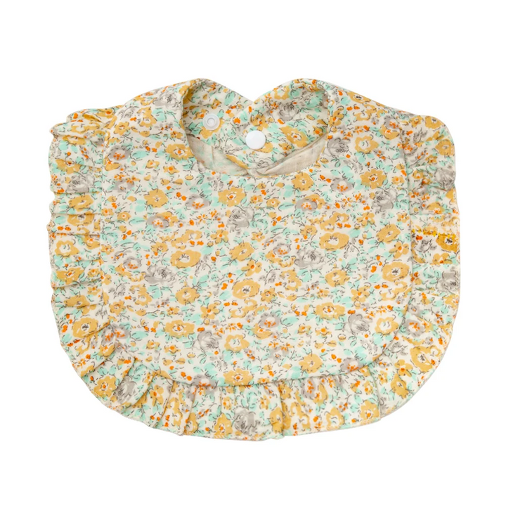 Mint-colored cotton baby bib with a dense yellow floral print and ruffled trim