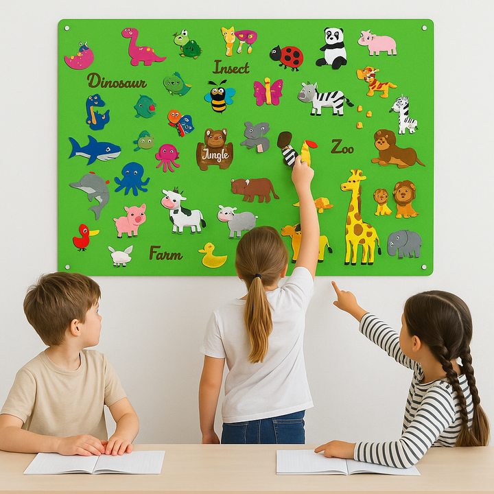 Three children exploring a mixed-animal felt board on the wall