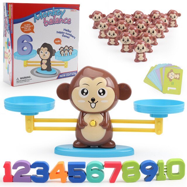 Monkey counting game with a balance scale, numeral weights, animal counters, activity cards, and box