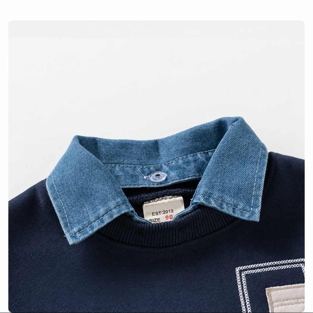 Close-up of the blue denim collar on the navy boys&