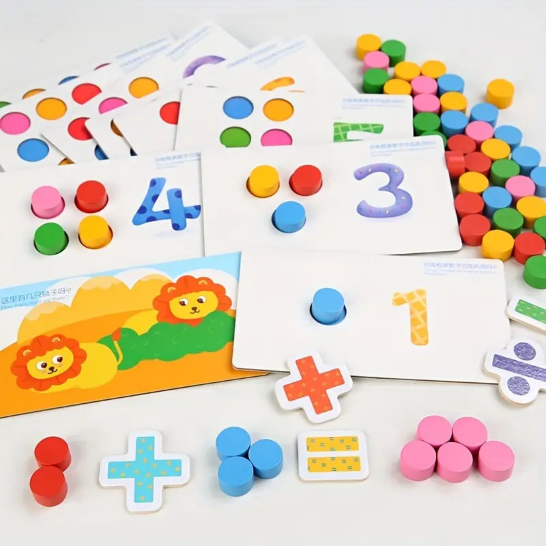 Number cards with colorful counters and math-symbol pieces on a white surface