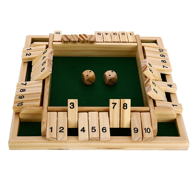 Angled view of the wooden board game with two dice and raised and lowered number flaps