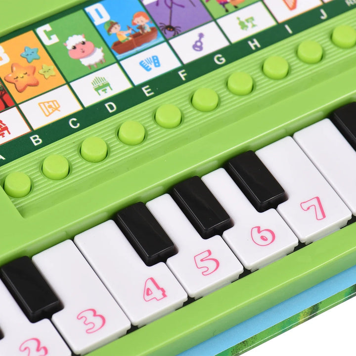 Close-up of numbered piano keys, green control buttons, and colorful animal illustrations