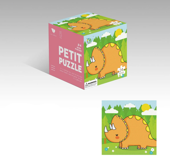 Orange dinosaur jigsaw puzzle with green scenery and a matching cube box