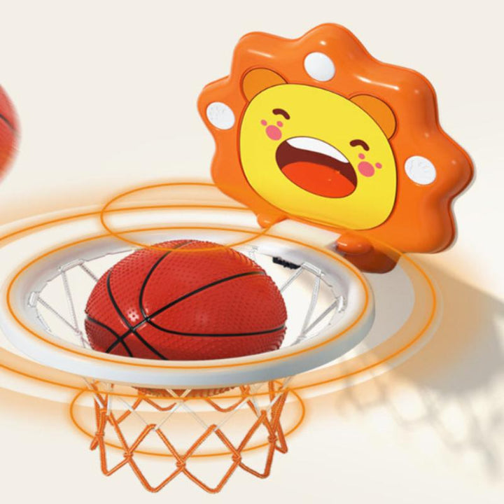 Close-up of the orange lion backboard, white hoop, net, and red basketball