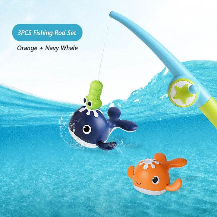 Magnetic fishing rod catching a navy whale beside an orange whale in the three-piece dark set.
