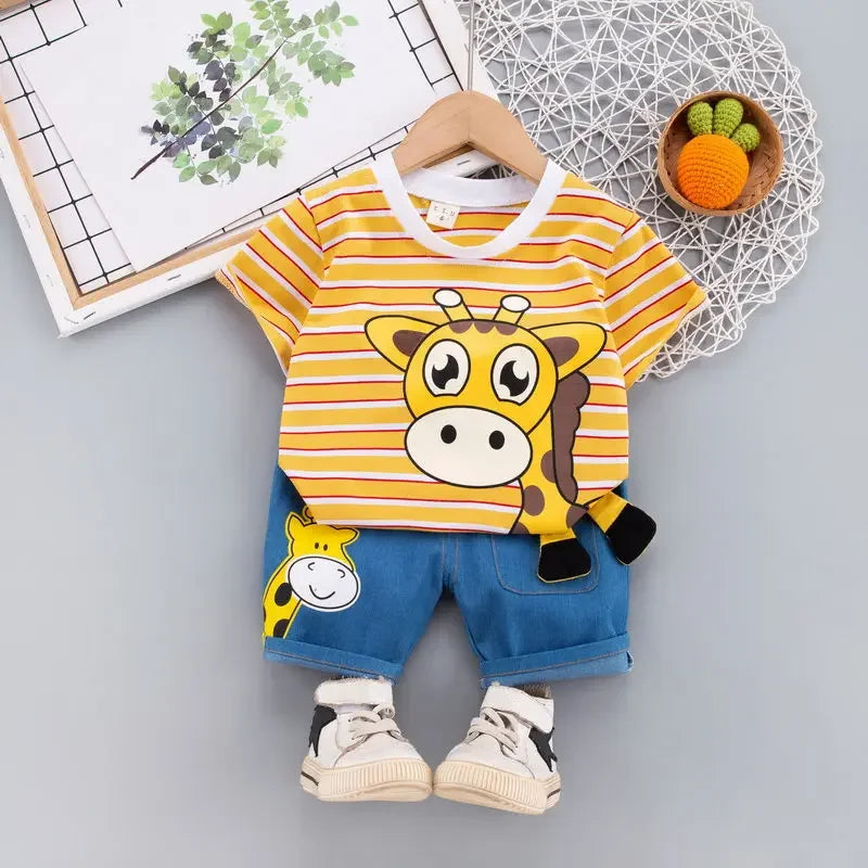Orange striped giraffe T-shirt with blue shorts and a giraffe graphic on one leg