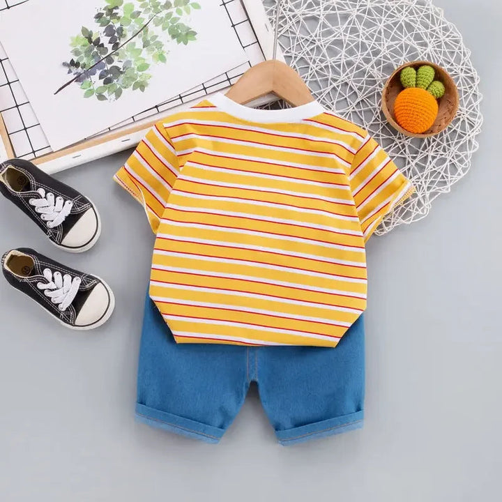 Back view of the orange striped T-shirt and blue shorts