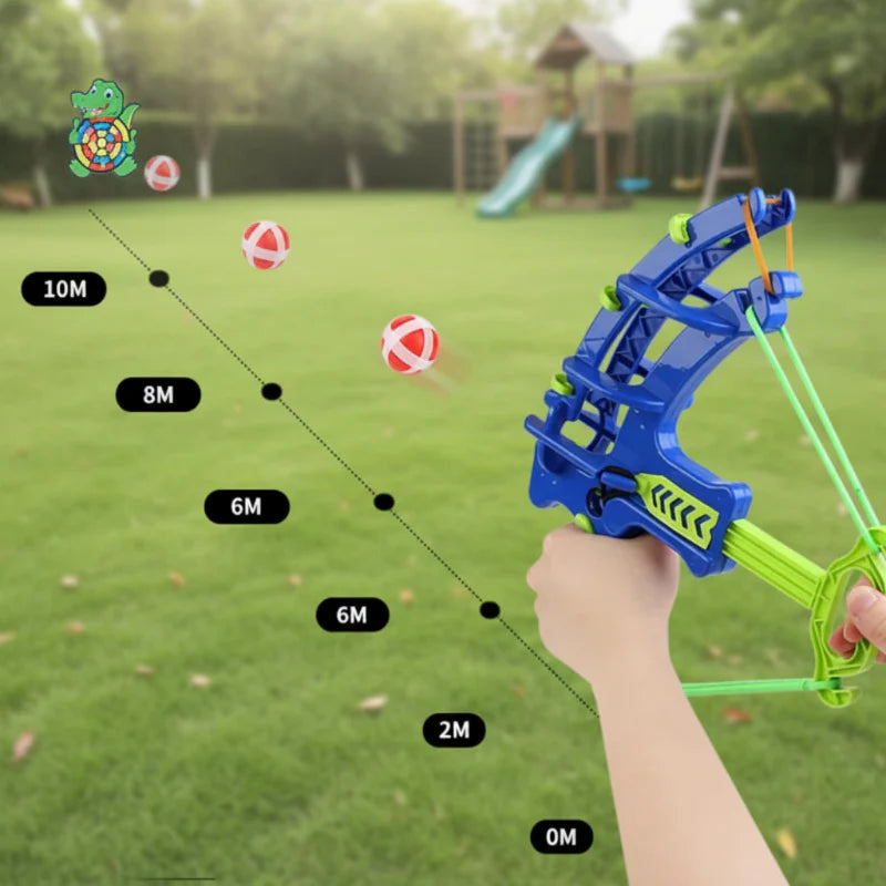 Outdoor aiming diagram with a blue launcher, sticky balls, and a distant animal target