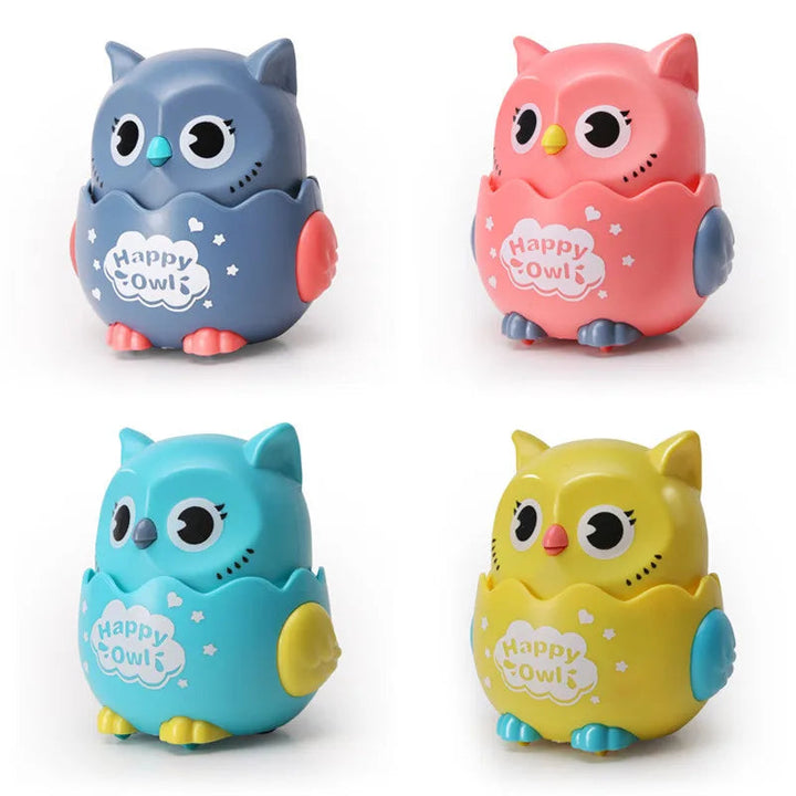 Gray, pink, blue, and yellow owl toy cars with contrasting wings and feet.
