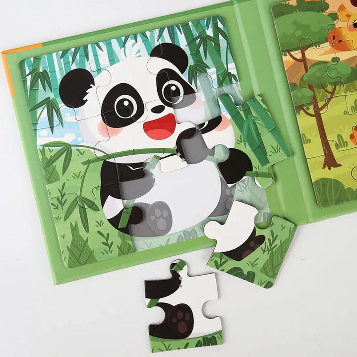 Close-up of a panda puzzle in the green magnetic book with a loose piece below the board.