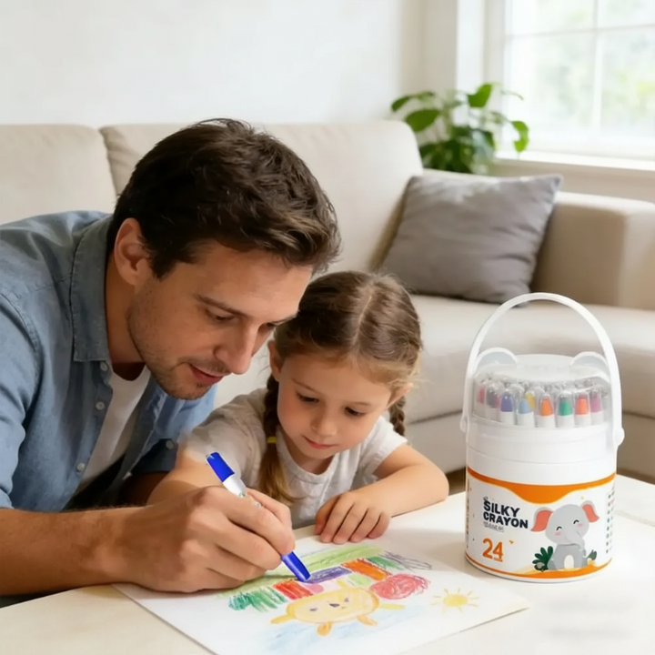 An adult and child coloring together beside a 24-color crayon case