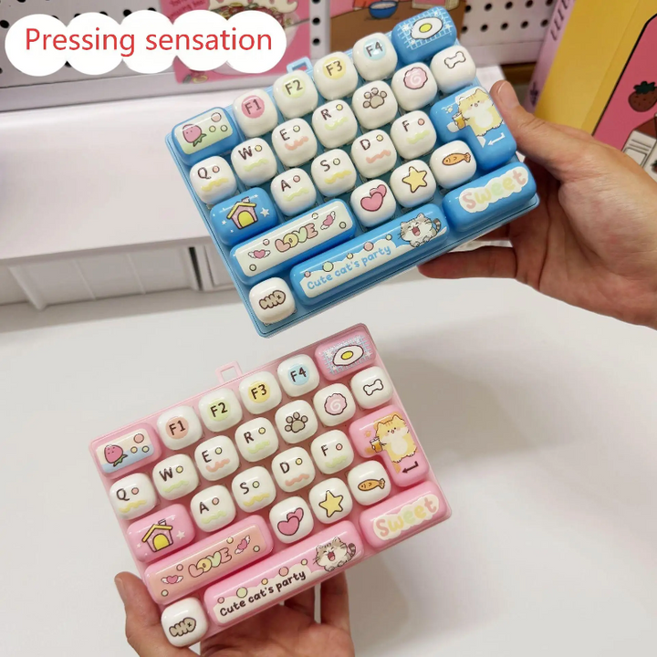 Handheld light blue and light pink fidget keyboards showing their raised keys