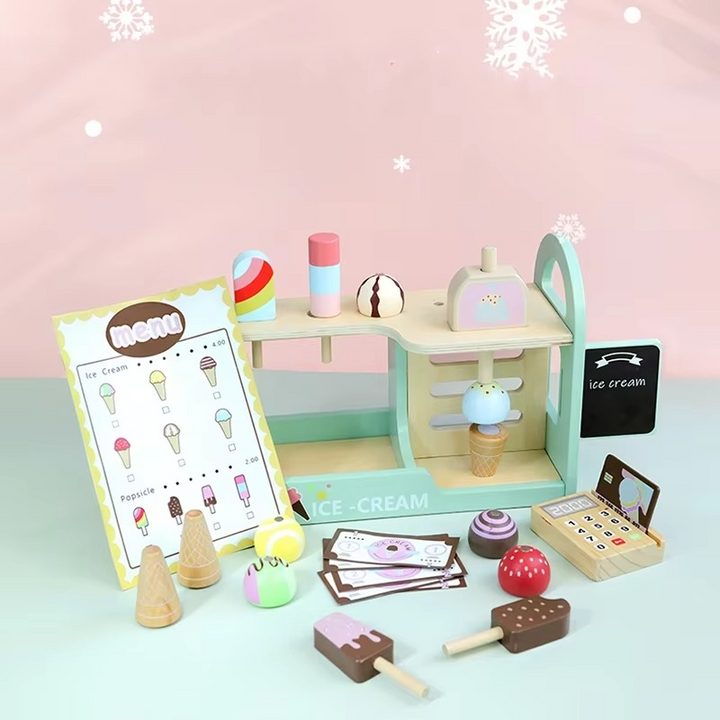 Pastel ice cream shop counter with toy treats, a menu, play money, and a cash register