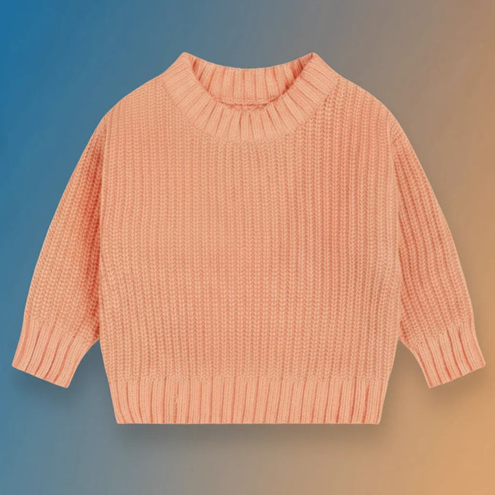 Peach-orange knit sweater with a round neckline, long sleeves, and ribbed trim.