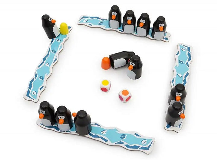 Penguin pieces on ice-themed boards with revealed eggs and color-dot dice