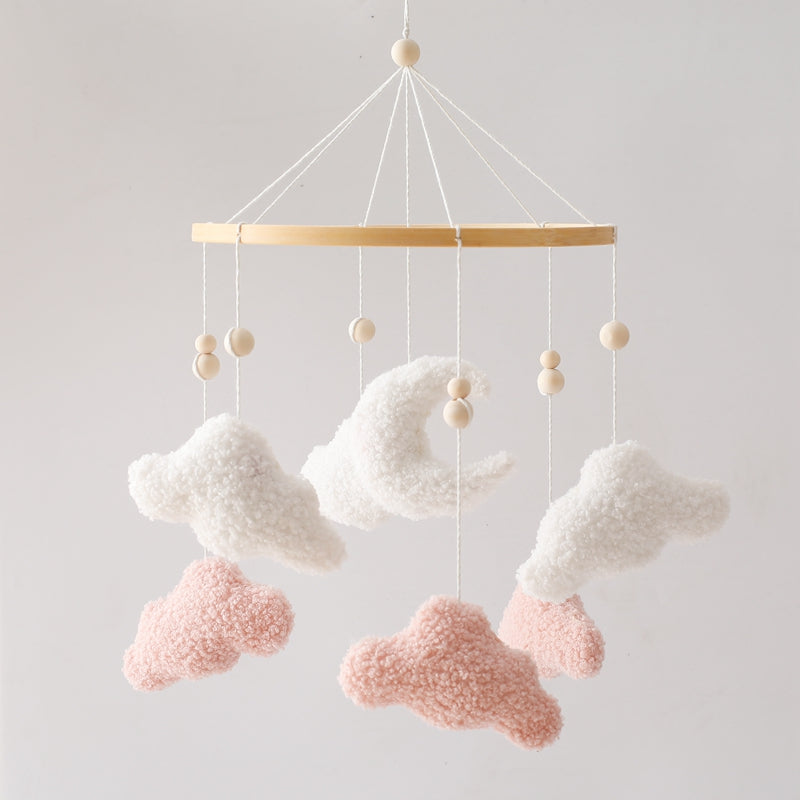 Wooden ring mobile with white clouds, pink clouds, and a white crescent moon