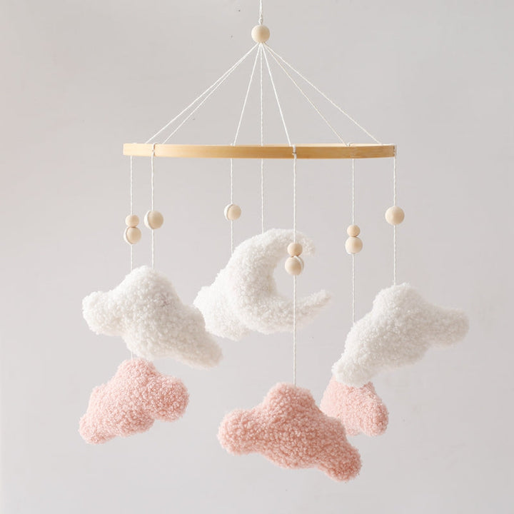 Wooden ring mobile with white clouds, pink clouds, and a white crescent moon