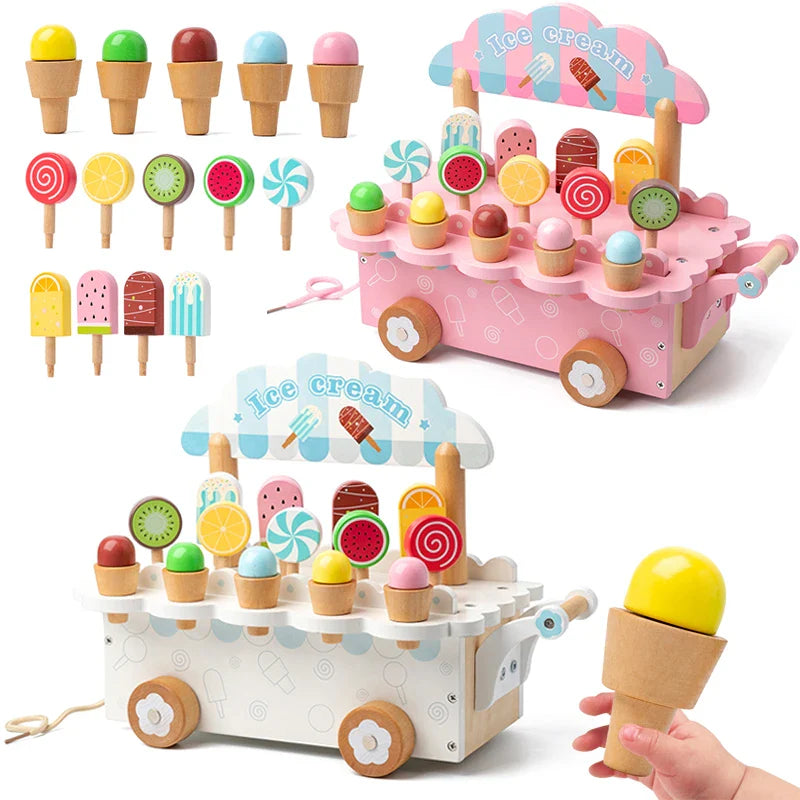 Pink and white wooden ice cream carts with pretend cones, ice pops, and lollipops
