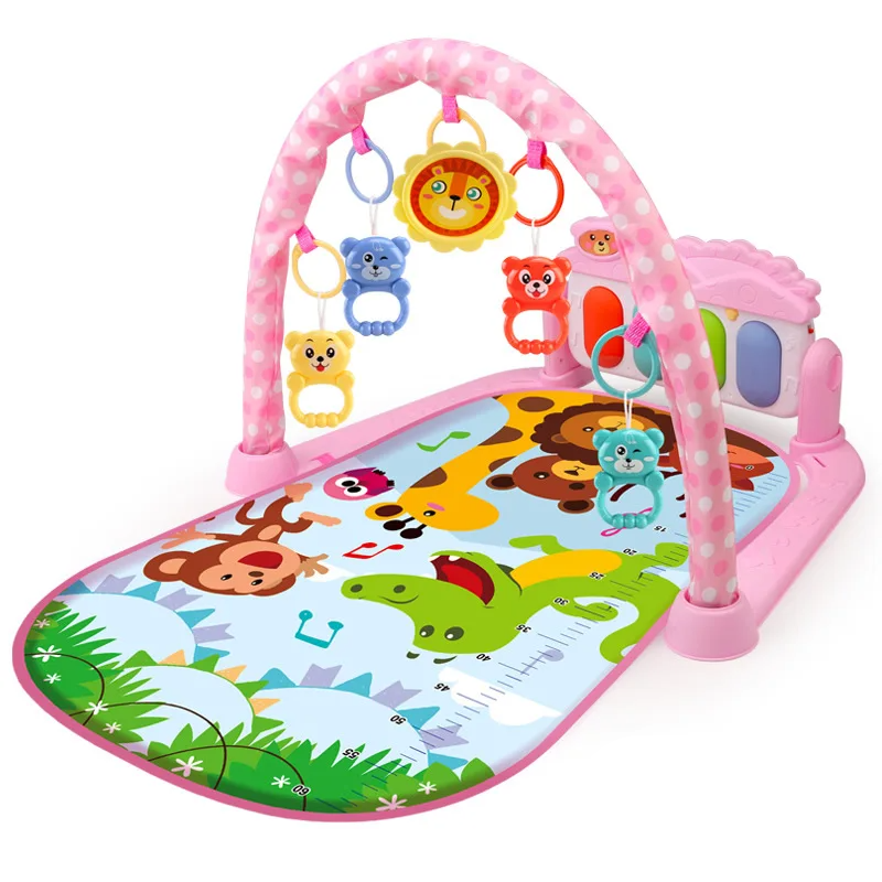 Pink animal-print baby gym with a hanging lion toy and piano panel