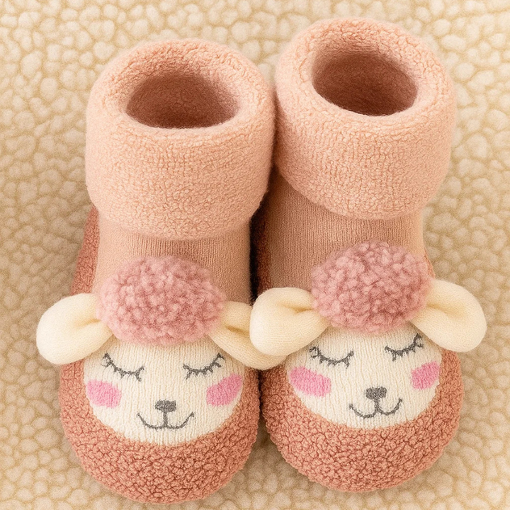 Pink baby socks with cream animal faces, raised ears, rosy cheeks, and fold-over cuffs