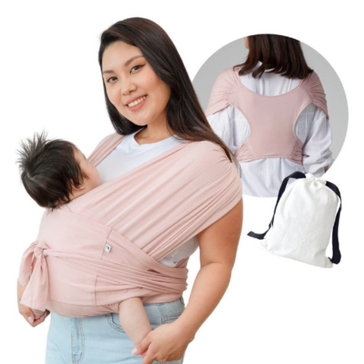Pink baby carrier shown with a baby at the chest, a back view and a drawstring pouch