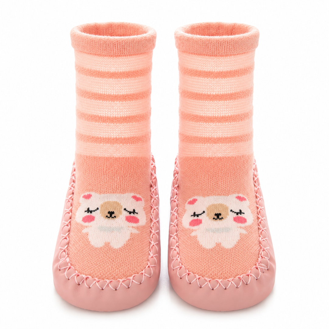 Pink sock shoes with bear faces and pale horizontal stripes, shown as a pair