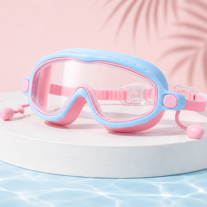 Pink-and-blue swimming goggles with clear lenses, a pink strap and attached earplugs