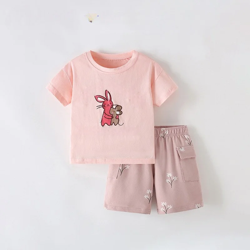 Pink bunny-graphic T-shirt with mauve patterned shorts