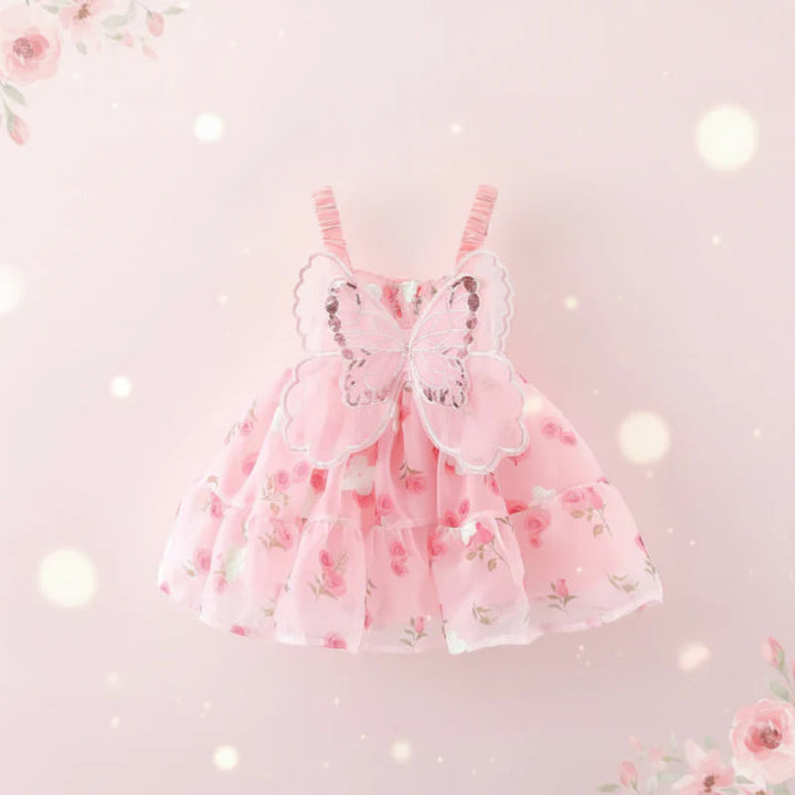 Pink floral baby dress with butterfly wings and a tiered skirt