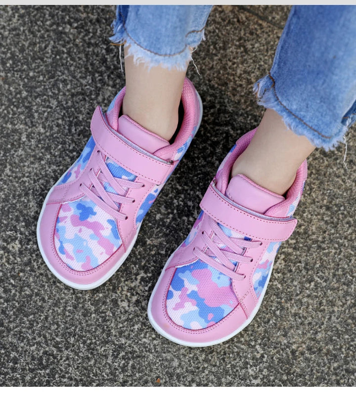 Pink patterned sneakers shown from above, with matching laces and wide straps