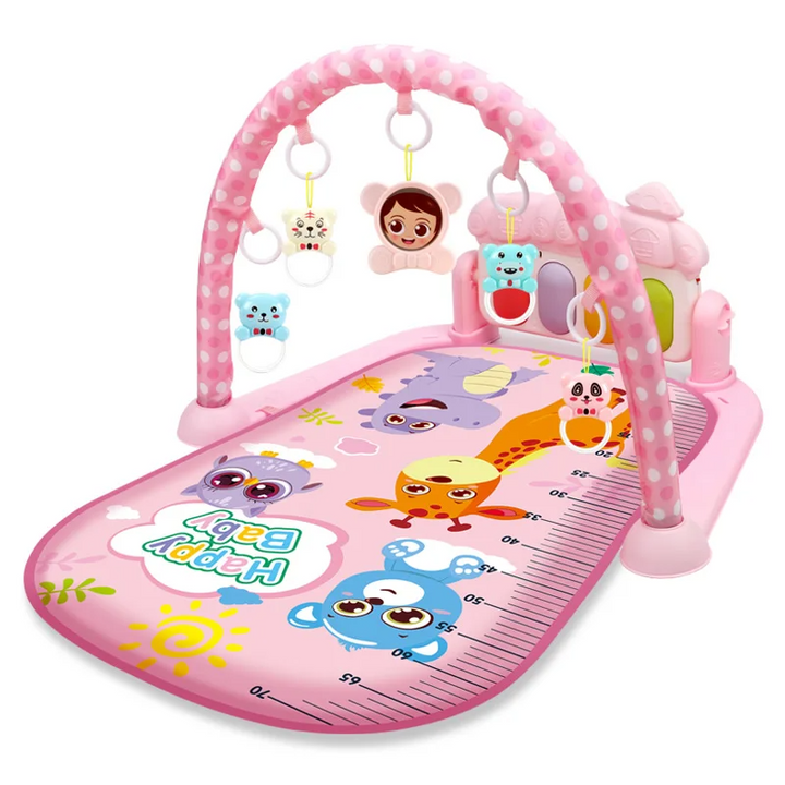 Pink cartoon animal play mat with a dotted arch and hanging animal toys