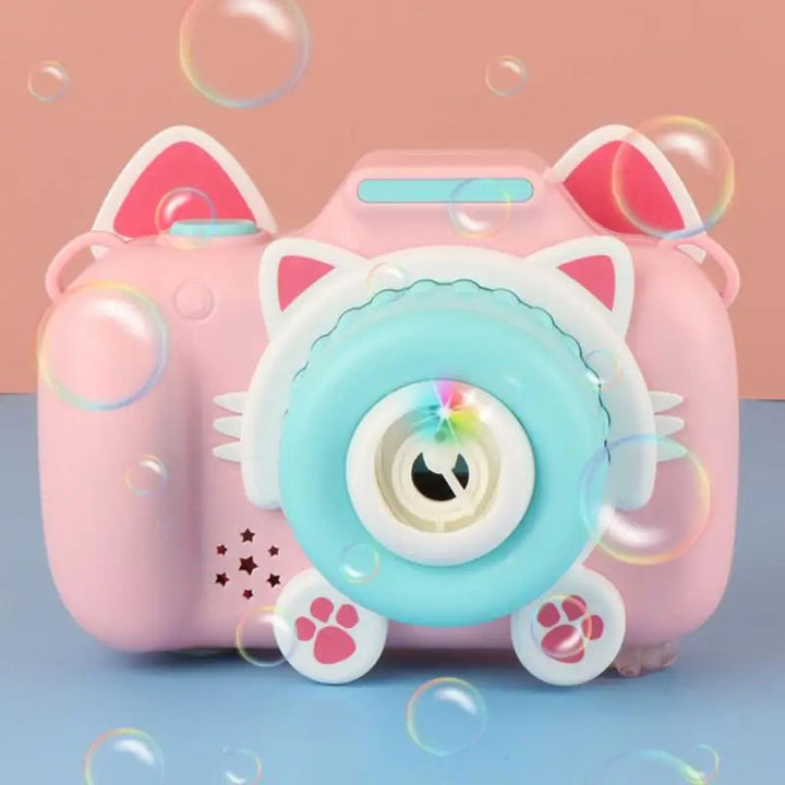 Front view of a pink cat-shaped bubble camera with a blue bubble outlet and white paw details.