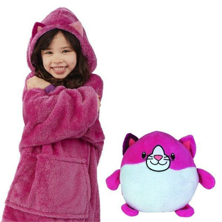 Child wearing a pink cat hoodie beside the pink and white cat plush toy.