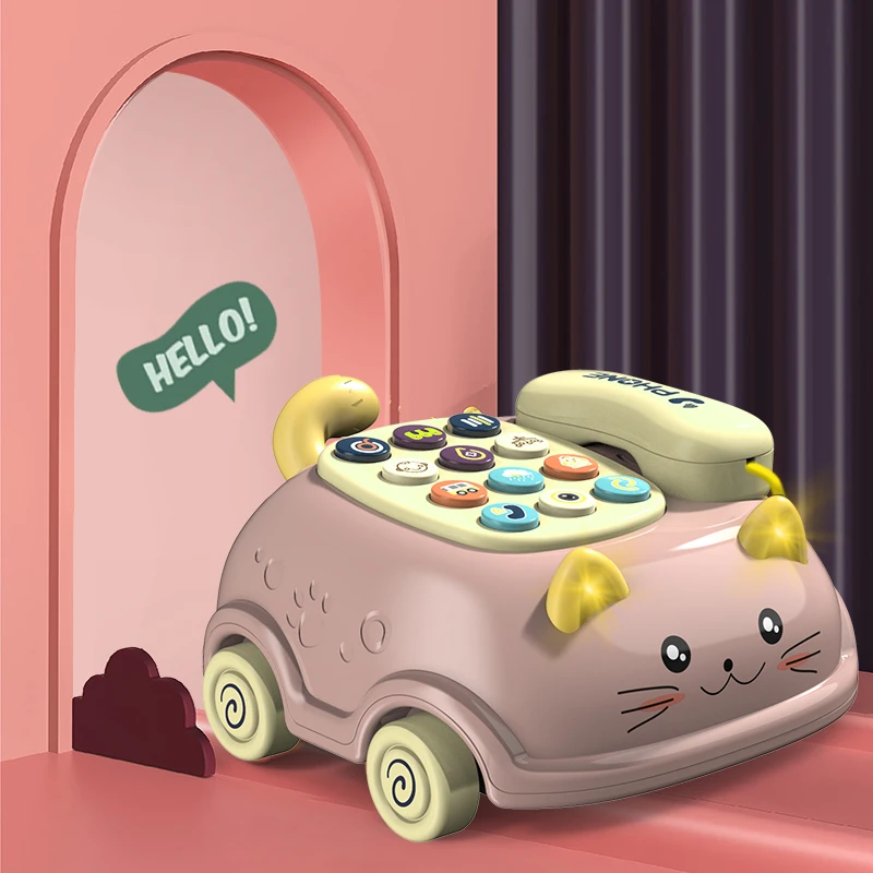 Pink cat-shaped toy phone with a cream handset and yellow ear details