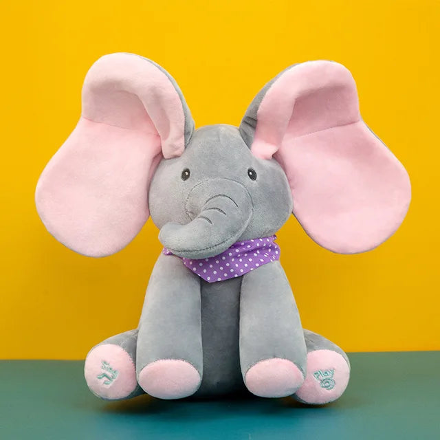 Gray elephant plush with pink ears and feet, wearing a purple polka-dot bandana
