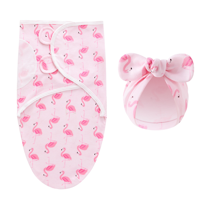 Flamingo-print newborn swaddle blanket and matching bow hat in pink
