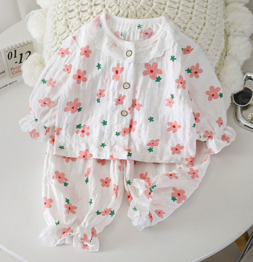 White floral pajama set with pink flowers, ruffled trim and gathered pant hems