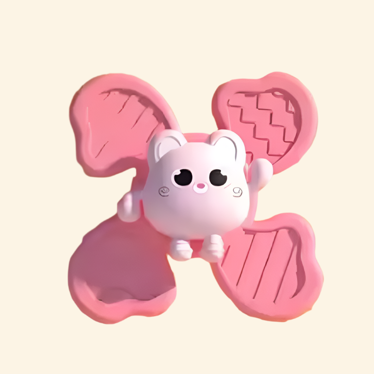 Pink four-arm animal spinner with a molded pattern on each arm